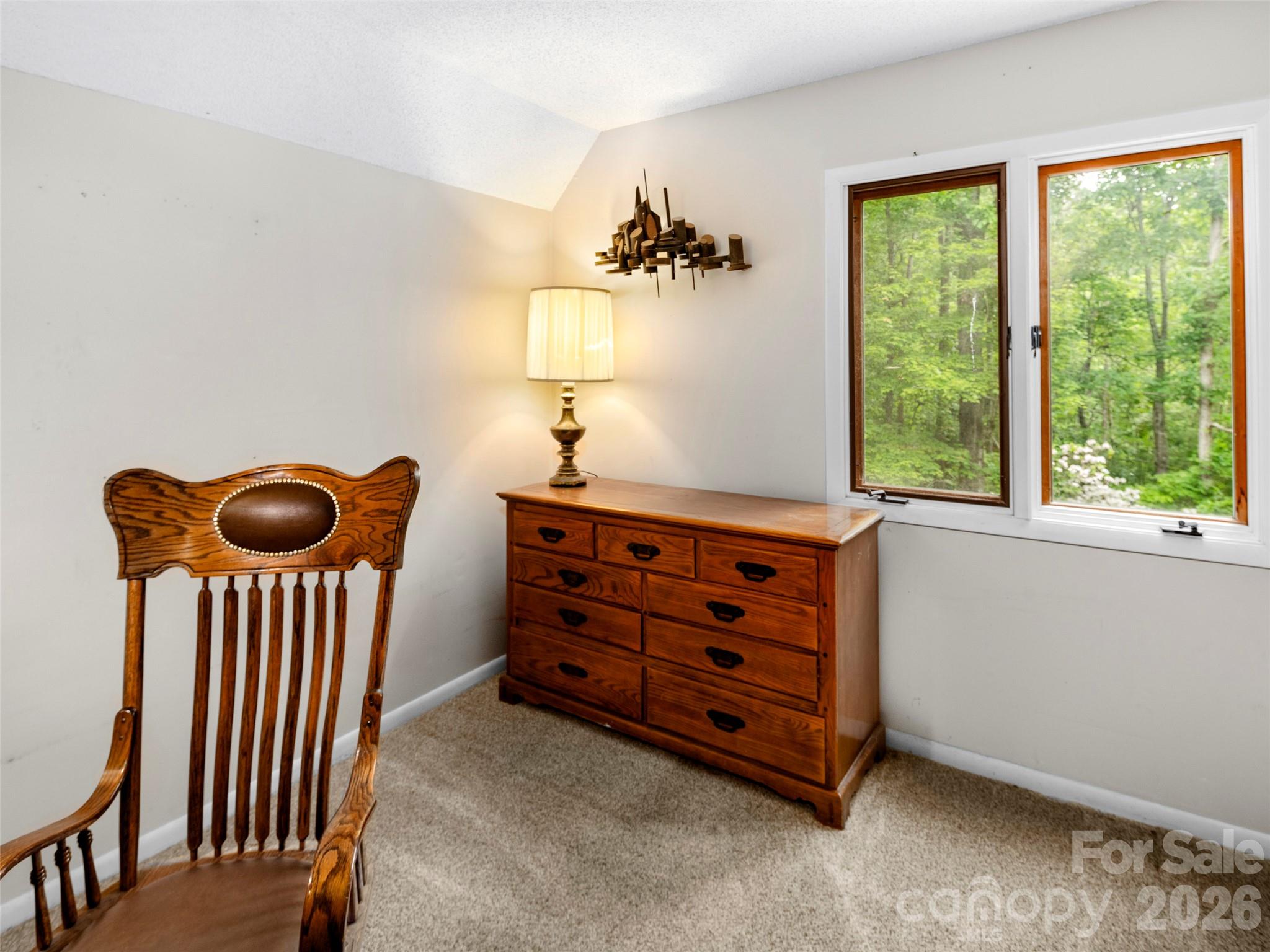 756 Pole Creasman Road Asheville, NC 28806 - Photo 12 of 29 a room with furniture and a window