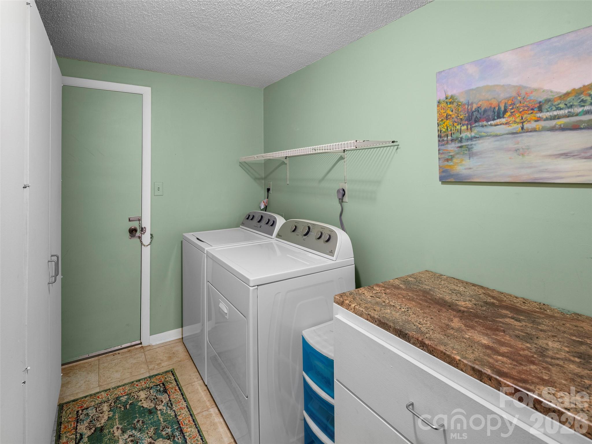 756 Pole Creasman Road Asheville, NC 28806 - Photo 13 of 29 a utility room with dryer and washer