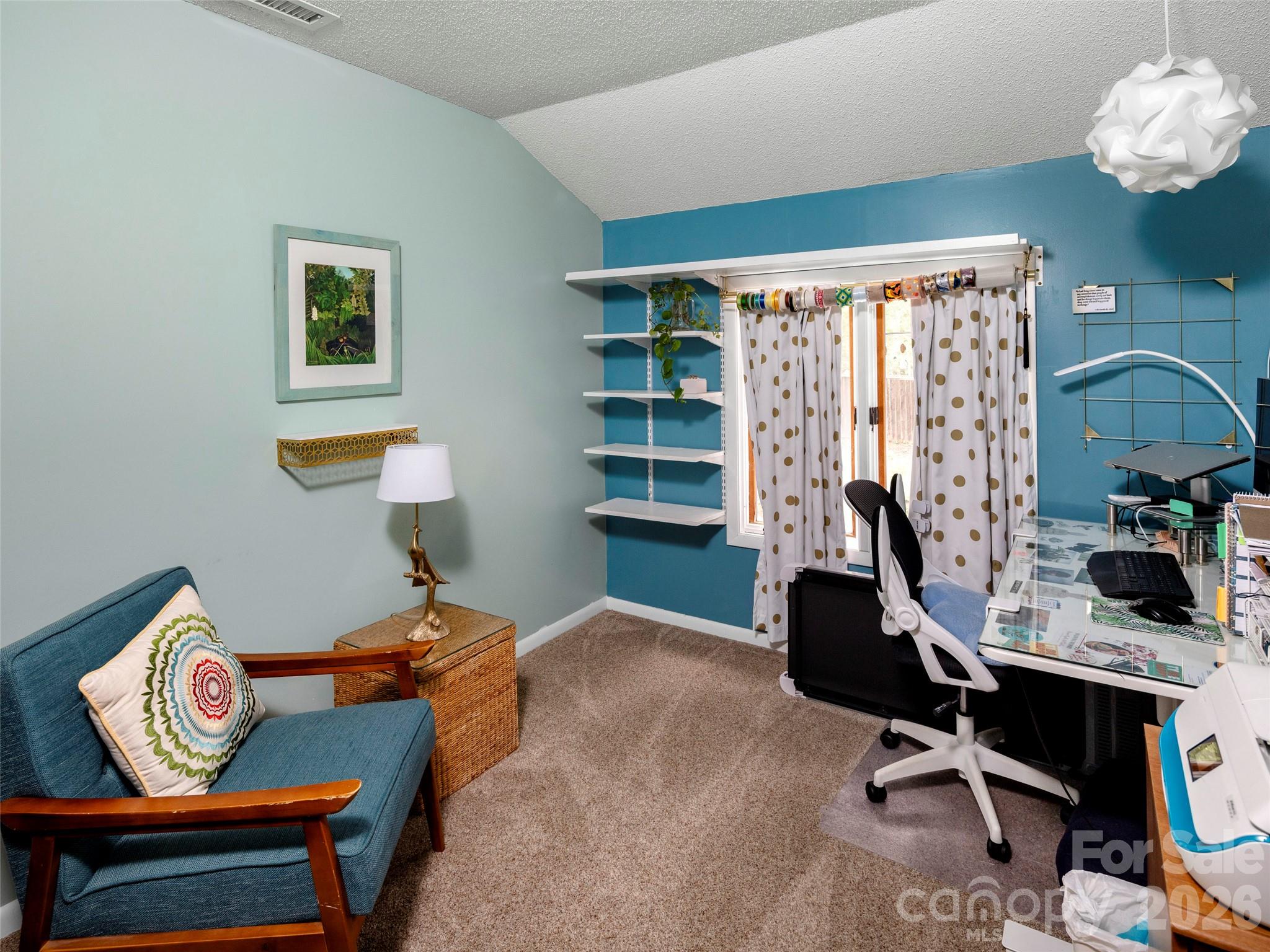 756 Pole Creasman Road Asheville, NC 28806 - Photo 19 of 29 a workspace with furniture and a window