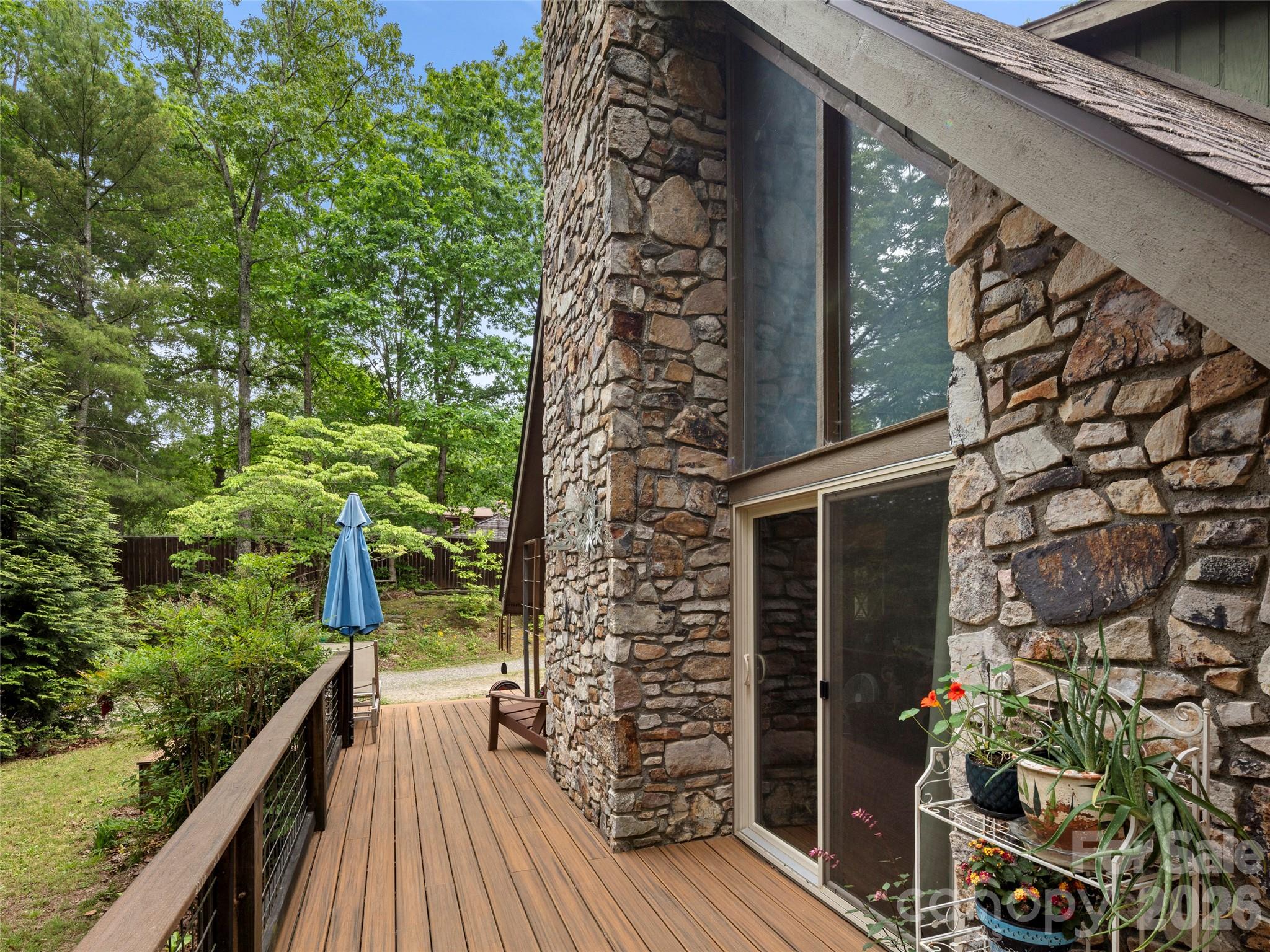 756 Pole Creasman Road Asheville, NC 28806 - Photo 24 of 29 a balcony with wooden floor