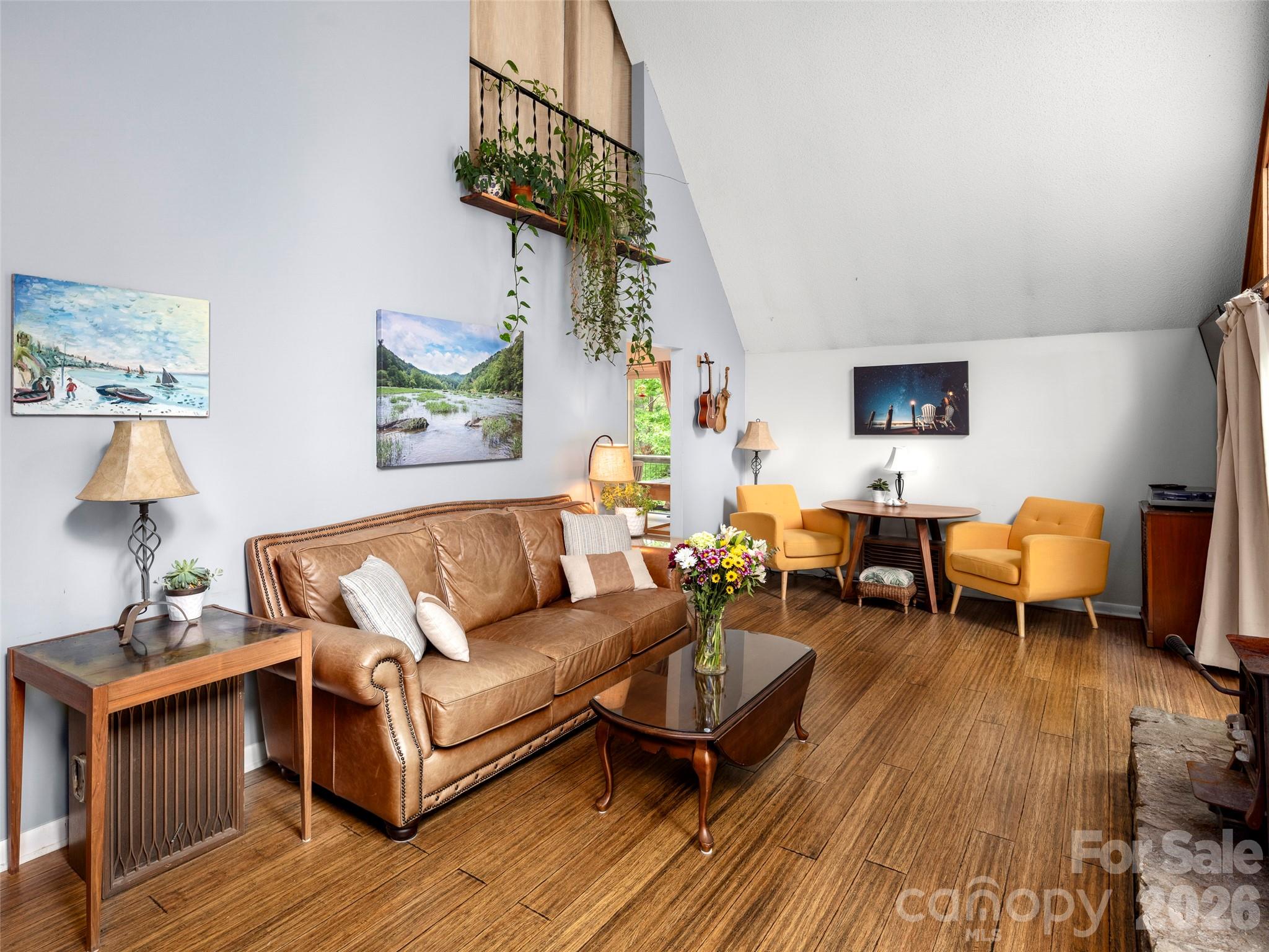 756 Pole Creasman Road Asheville, NC 28806 - Photo 9 of 29 a living room with furniture and a wooden floor