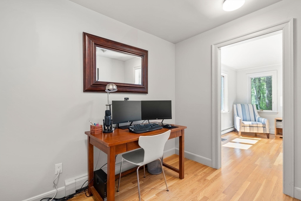 15 Ridge Hill Farm Road Wellesley, MA 02482 - Photo 23 of 38 a workspace with furniture and wooden floor