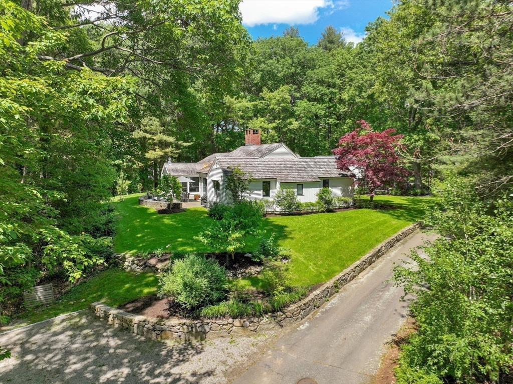 15 Ridge Hill Farm Road Wellesley, MA 02482 - Photo 38 of 38 a view of a house with a yard and potted plants