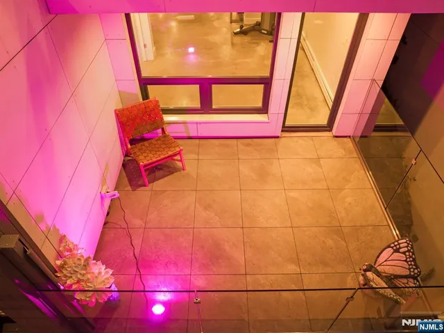 a view of livingroom with furniture and front door