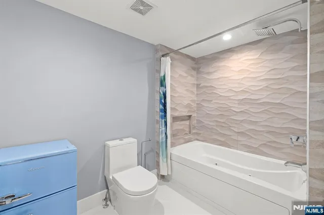 an empty room with wooden floor