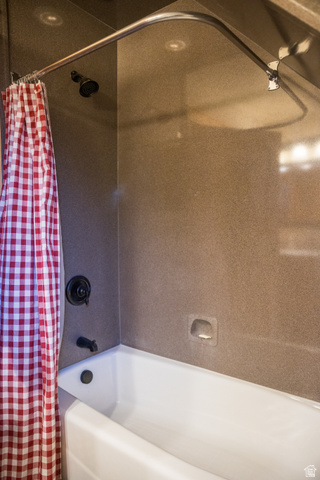 18906 North Canyon Road Whiterocks, UT 84085 - Photo 42 of 65 Full bath featuring shower / bath combo with shower curtain