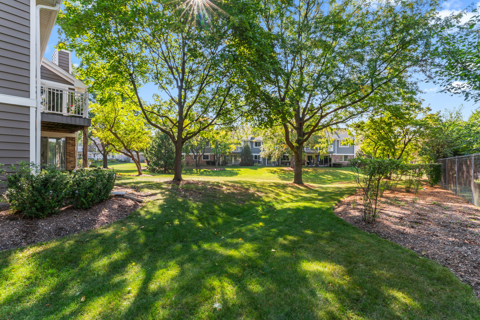 601 Hanover Court, Unit Z2 Schaumburg, IL 60194 - Photo 21 of 22 a view of yard with green space