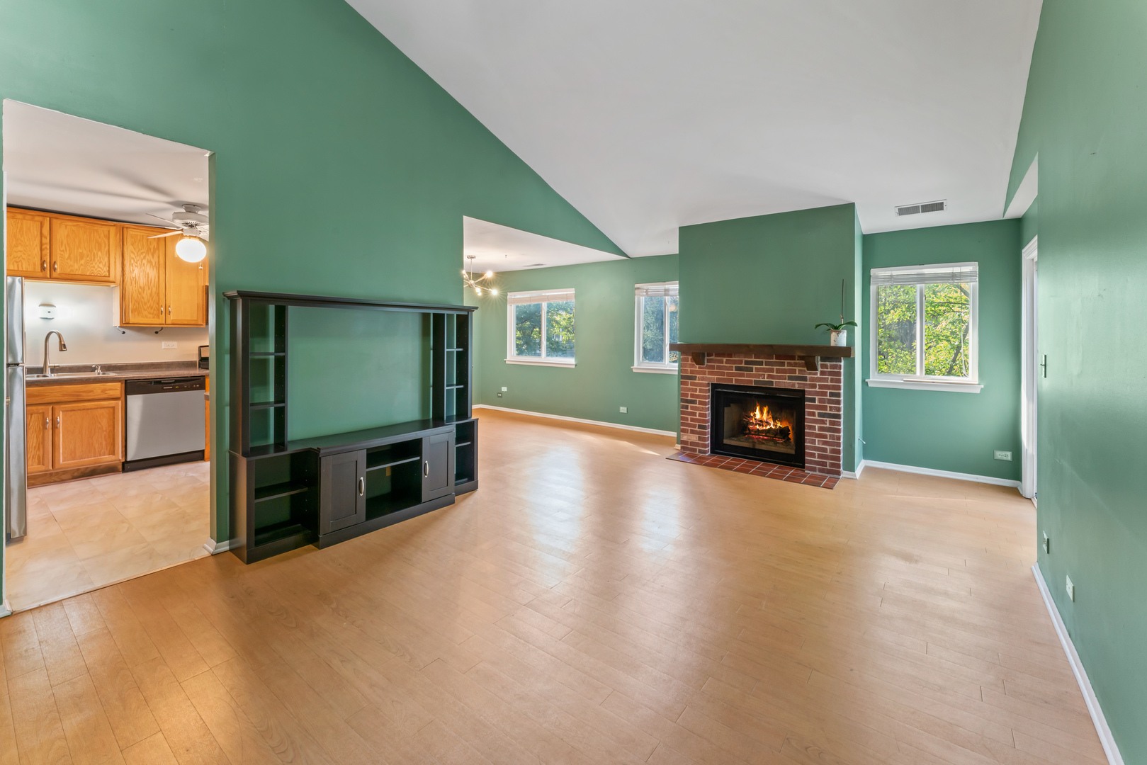 601 Hanover Court, Unit Z2 Schaumburg, IL 60194 - Photo 5 of 22 a view of living room with furniture and a fireplace