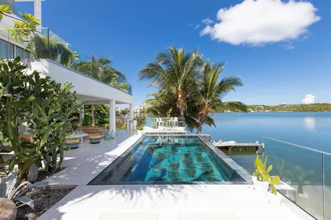 a view of swimming pool with a patio