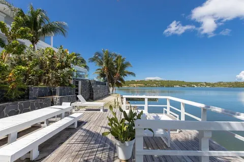 a view of balcony with furniture