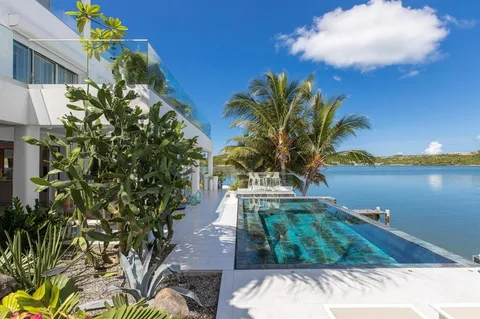 a view of a backyard of the house