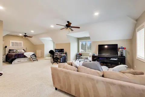 a picture of a rug with a white wall and a picture