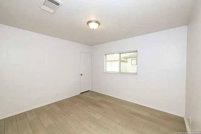 an empty room with a workspace