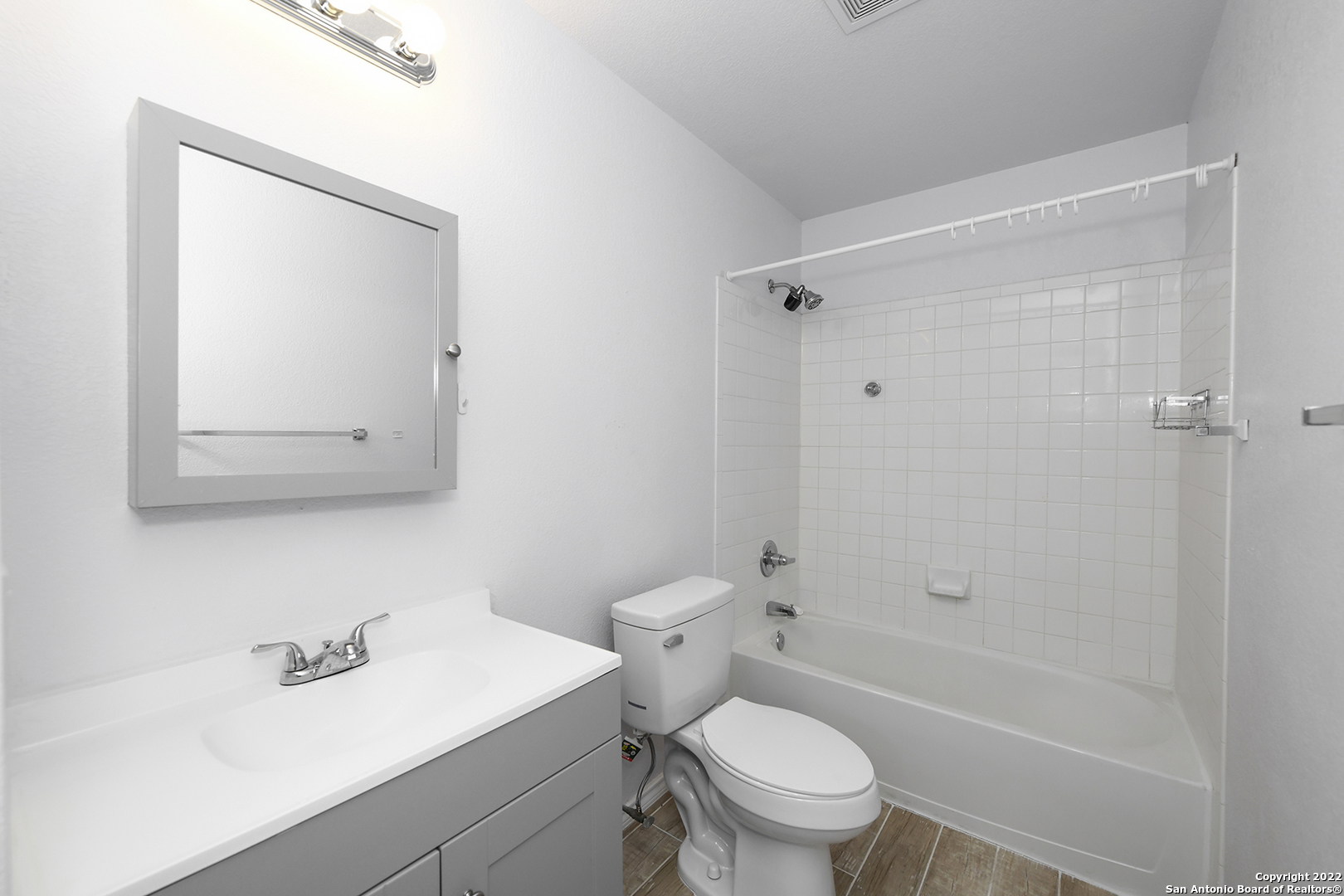 10 Torreys Post San Antonio, TX 78240 - Photo 22 of 27 a bathroom with a sink a toilet and shower
