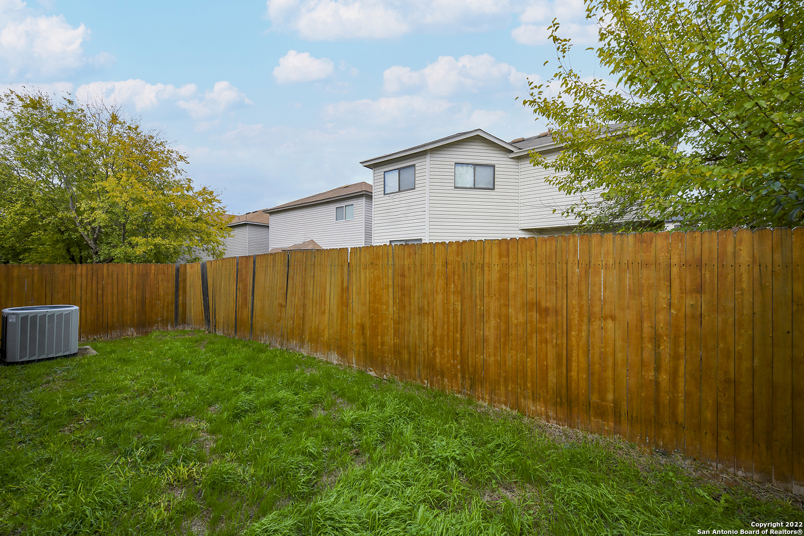 10 Torreys Post San Antonio, TX 78240 - Photo 26 of 27 a view of a backyard with a cabin