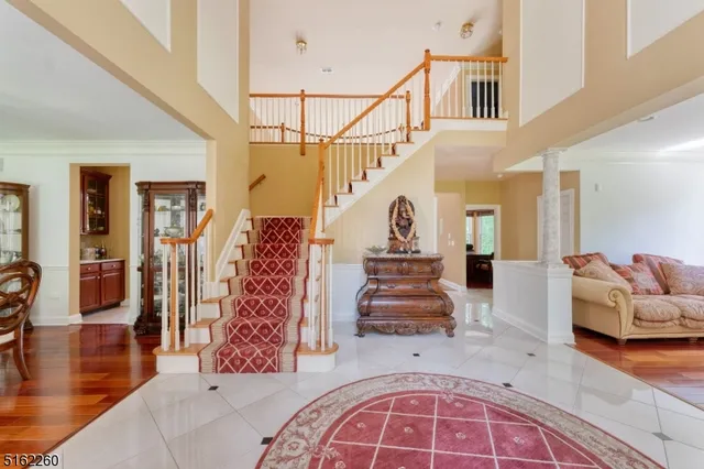 a view of living room and dining room