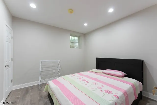 a bedroom with a bed and a closet