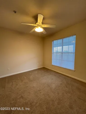 a bathroom with a sink a toilet a shower and a mirror
