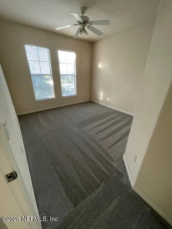 a kitchen with a refrigerator stove and microwave