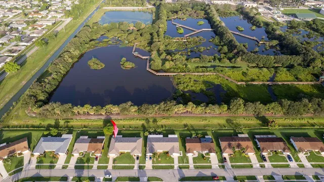 a view of swimming pool with a patio