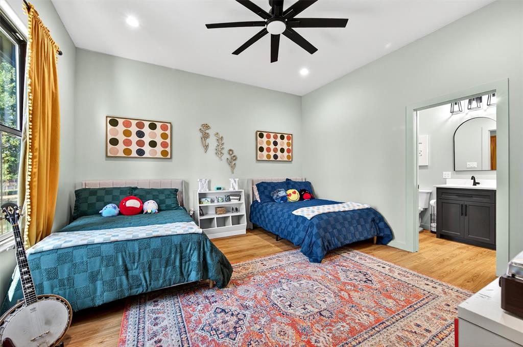 1838 Richerson Road Denison, TX 75021 - Photo 15 of 40 a bedroom with furniture and window