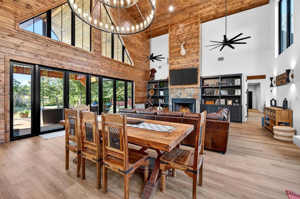 1838 Richerson Road Denison, TX 75021 - Photo 3 of 40 a dining room with furniture and wooden floor