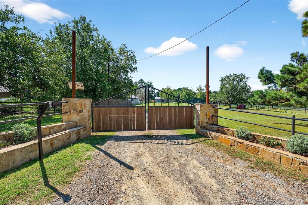 0 Richerson Road Denison, TX 75021 - Photo 33 of 40 a view of a backyard with wooden fence
