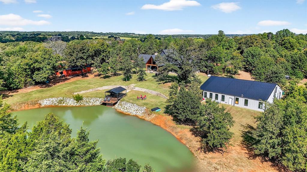 0 Richerson Road Denison, TX 75021 - Photo 39 of 40 an aerial view of lake residential house with outdoor space and trees all around