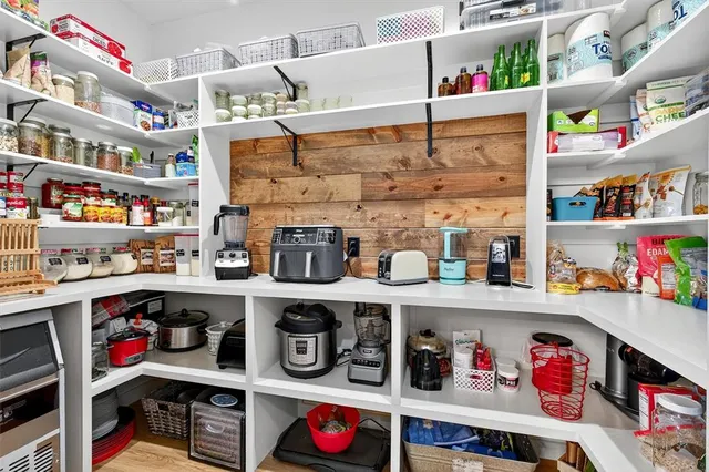 a room with storage and utility