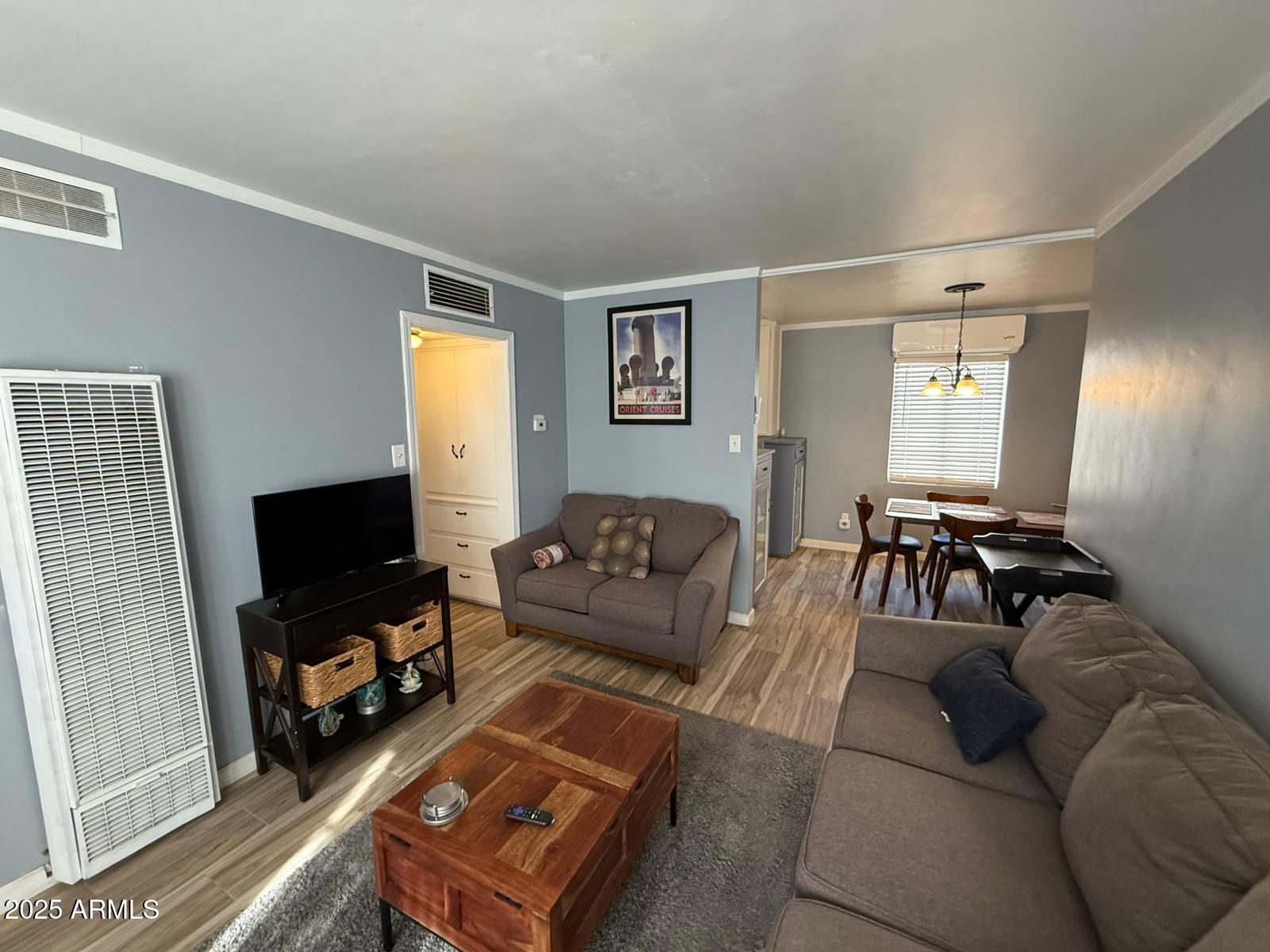 1224 F Avenue Douglas, AZ 85607 - Photo 2 of 16 a living room with furniture and a flat screen tv