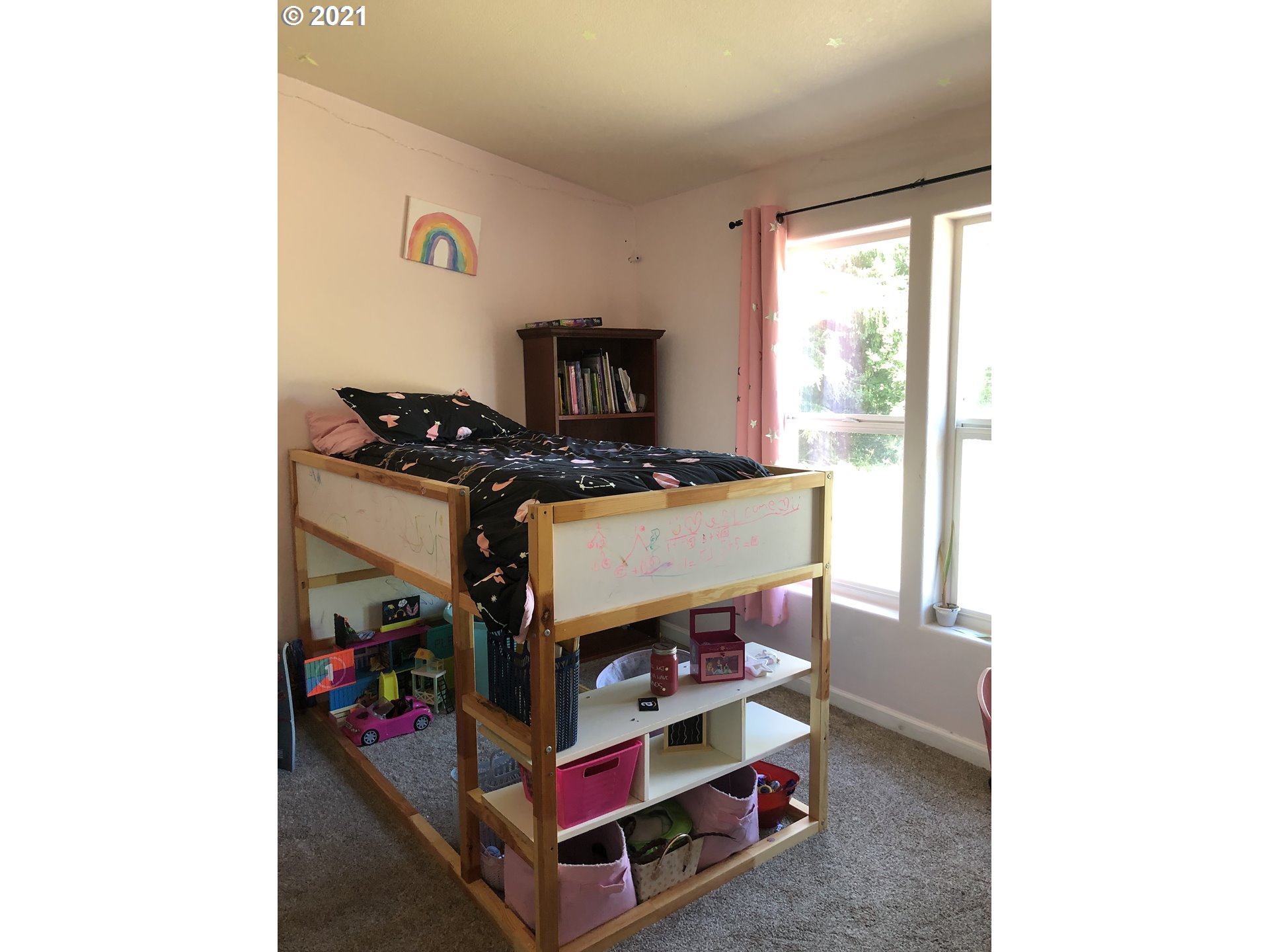 8245 Burbank Road Tillamook, OR 97141 - Photo 21 of 28 a room with furniture and a flat screen tv