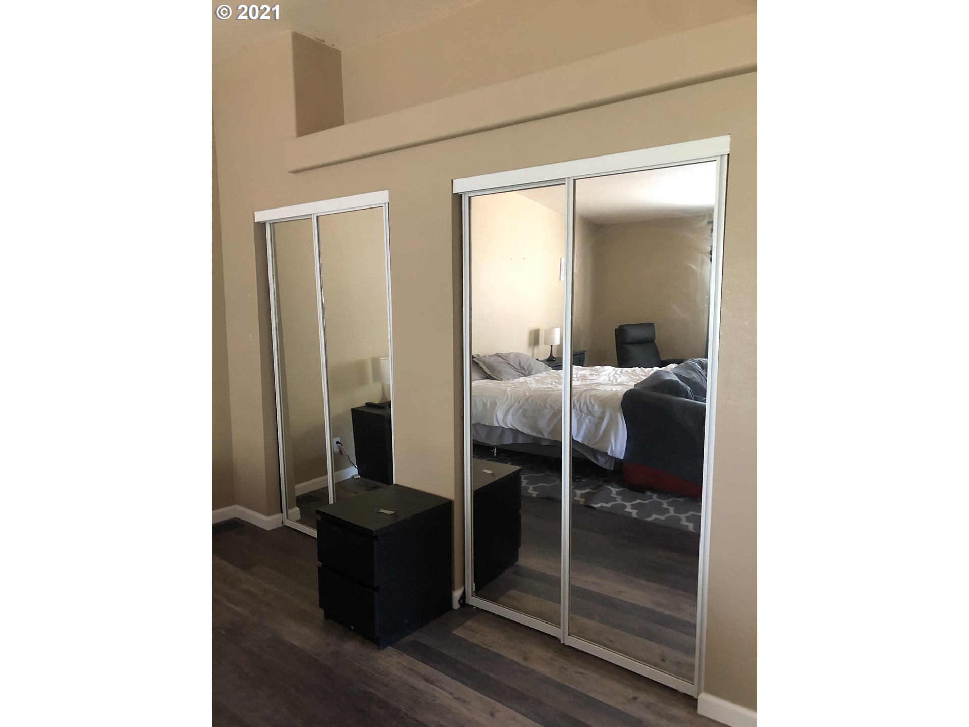 8245 Burbank Road Tillamook, OR 97141 - Photo 23 of 28 a room with a walk in closet and a mirror