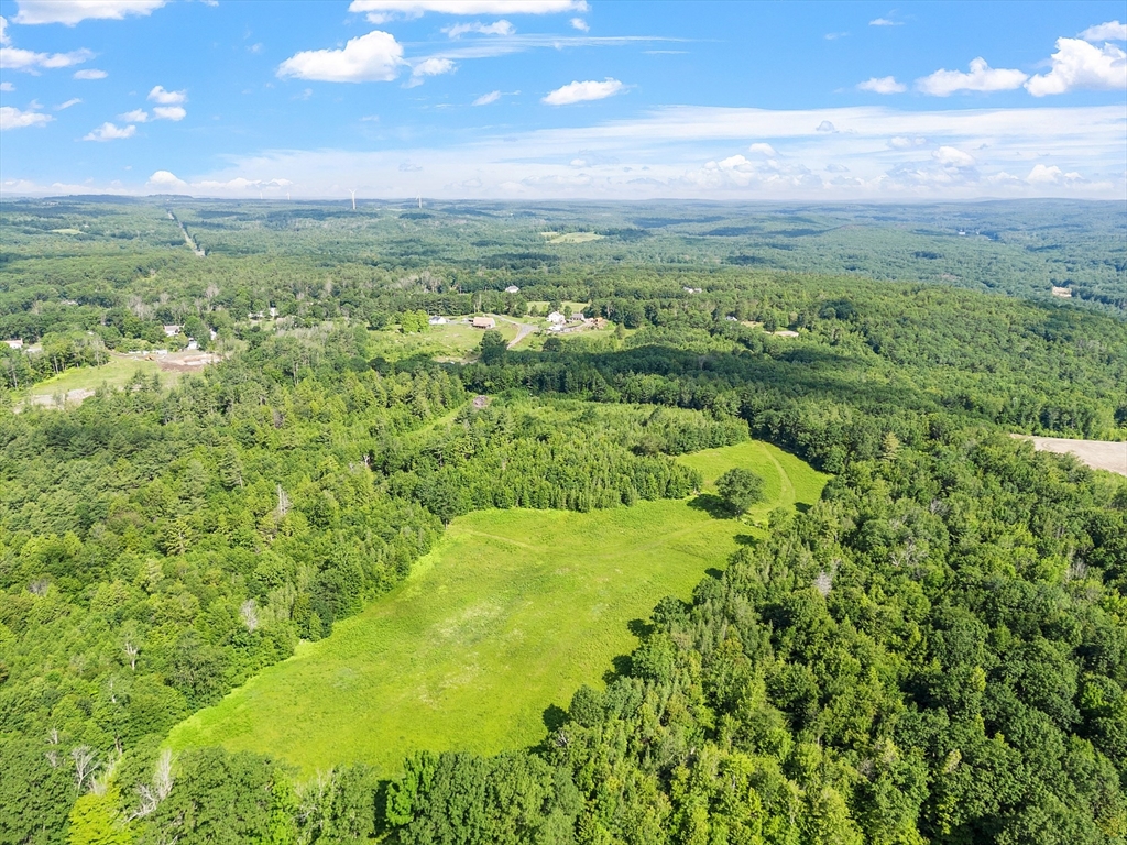 0 Syd Smith Road Westminster, MA 01473 - Photo 2 of 2 a view of a city with lush green forest