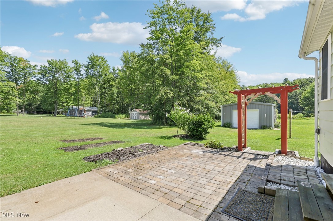 5097 Chillicothe Road Chagrin Falls, OH 44022 - Photo 37 of 45 View of patio / terrace with an outbuilding