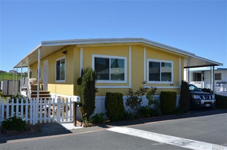2525 Flosden Road, Unit 24 American Canyon, CA 94503 - Photo 1 of 1 a front view of a house with garden