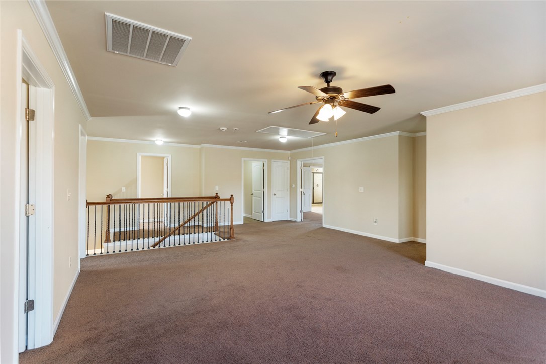1005 Winmar Drive Anderson, SC 29621 - Photo 28 of 50 This versatile loft area features ample space, a ceiling fan, and access to other rooms.