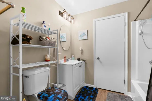 a utility room with sink dryer and washer