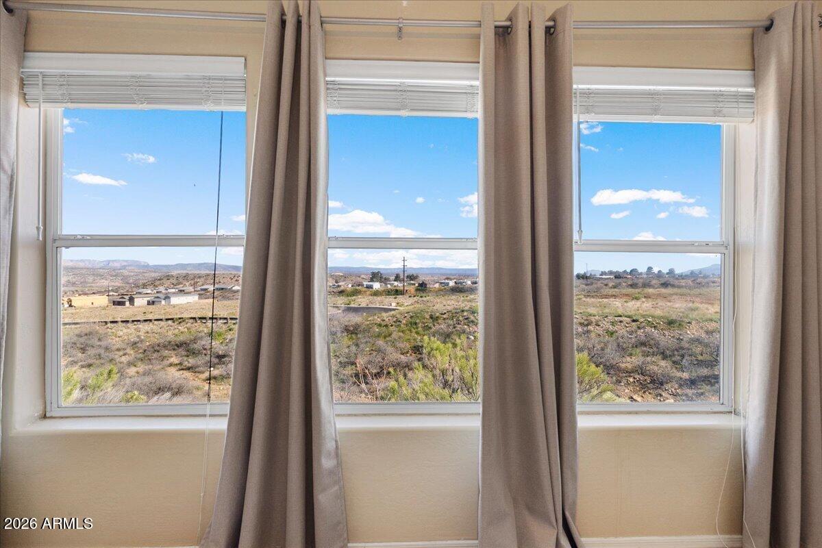 813 Alfonse Road Clarkdale, AZ 86324 - Photo 21 of 41 a view of a glass door with a door