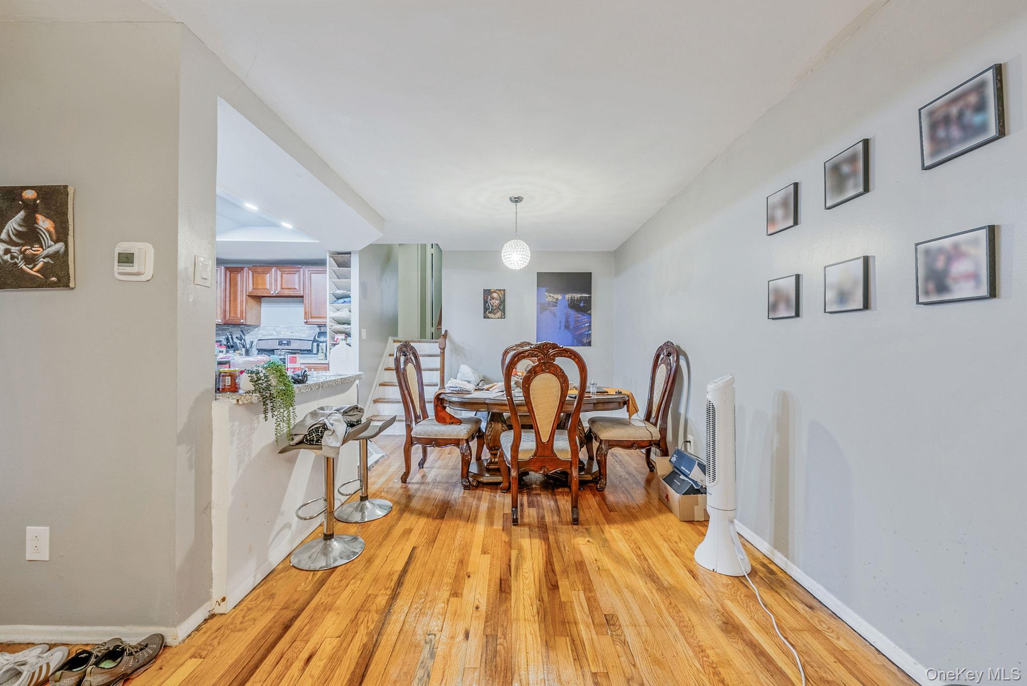 2070 Ralph Avenue Brooklyn, NY 11234 - Photo 17 of 48 a view of a dining room with furniture and wooden floor