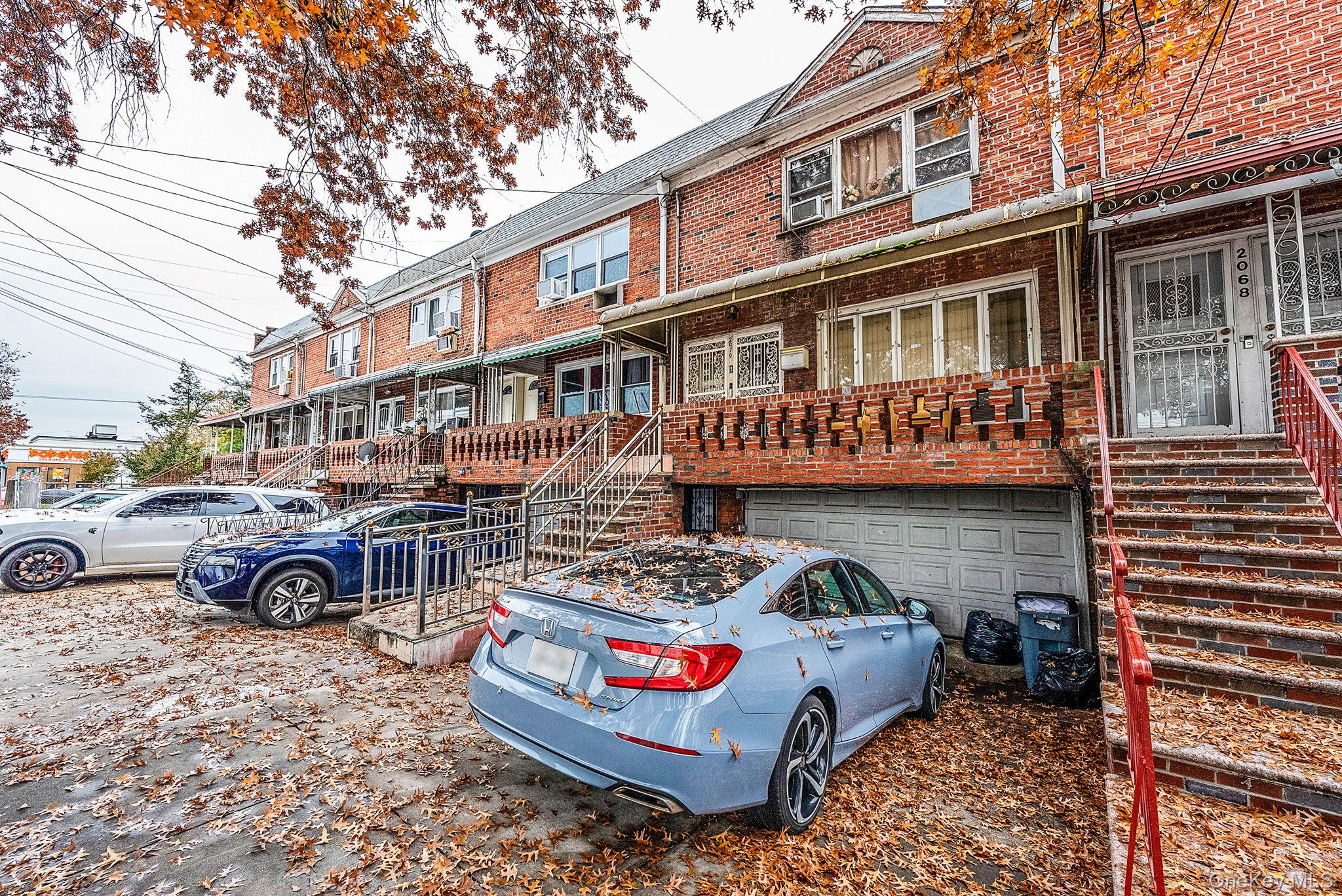 2070 Ralph Avenue Brooklyn, NY 11234 - Photo 3 of 48 a front view of a house with outdoor space