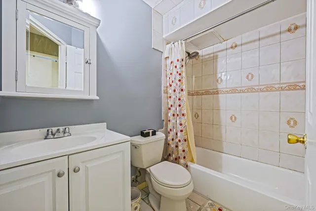 a bedroom with bed and a window