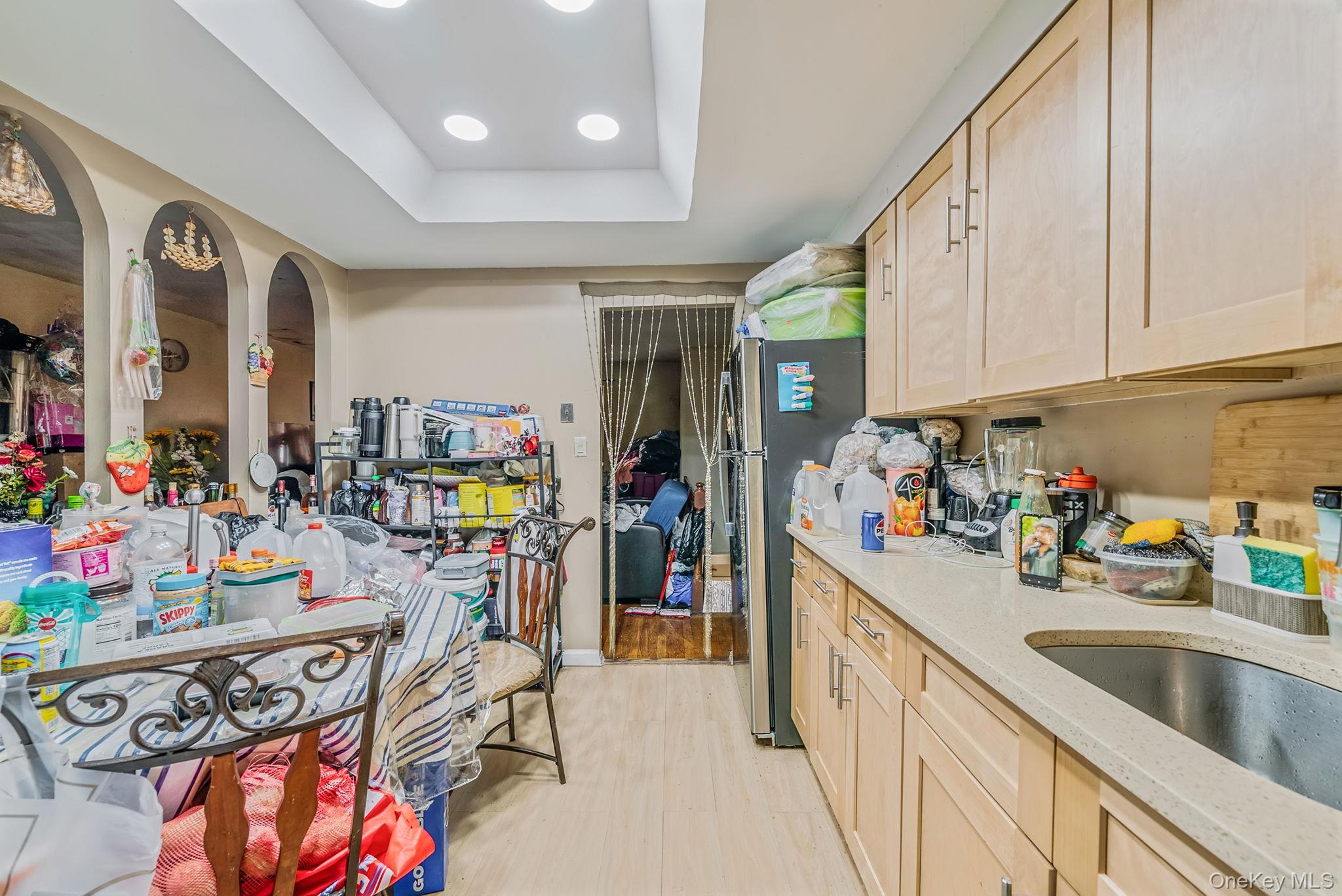 2070 Ralph Avenue Brooklyn, NY 11234 - Photo 47 of 48 a view of a kitchen with fridge and workspace