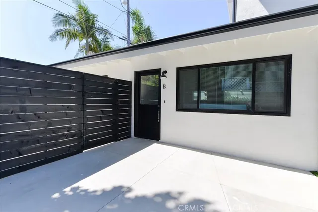 a view of the house with a large window