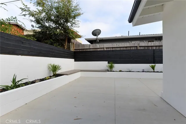 a view of a bench in front of a building
