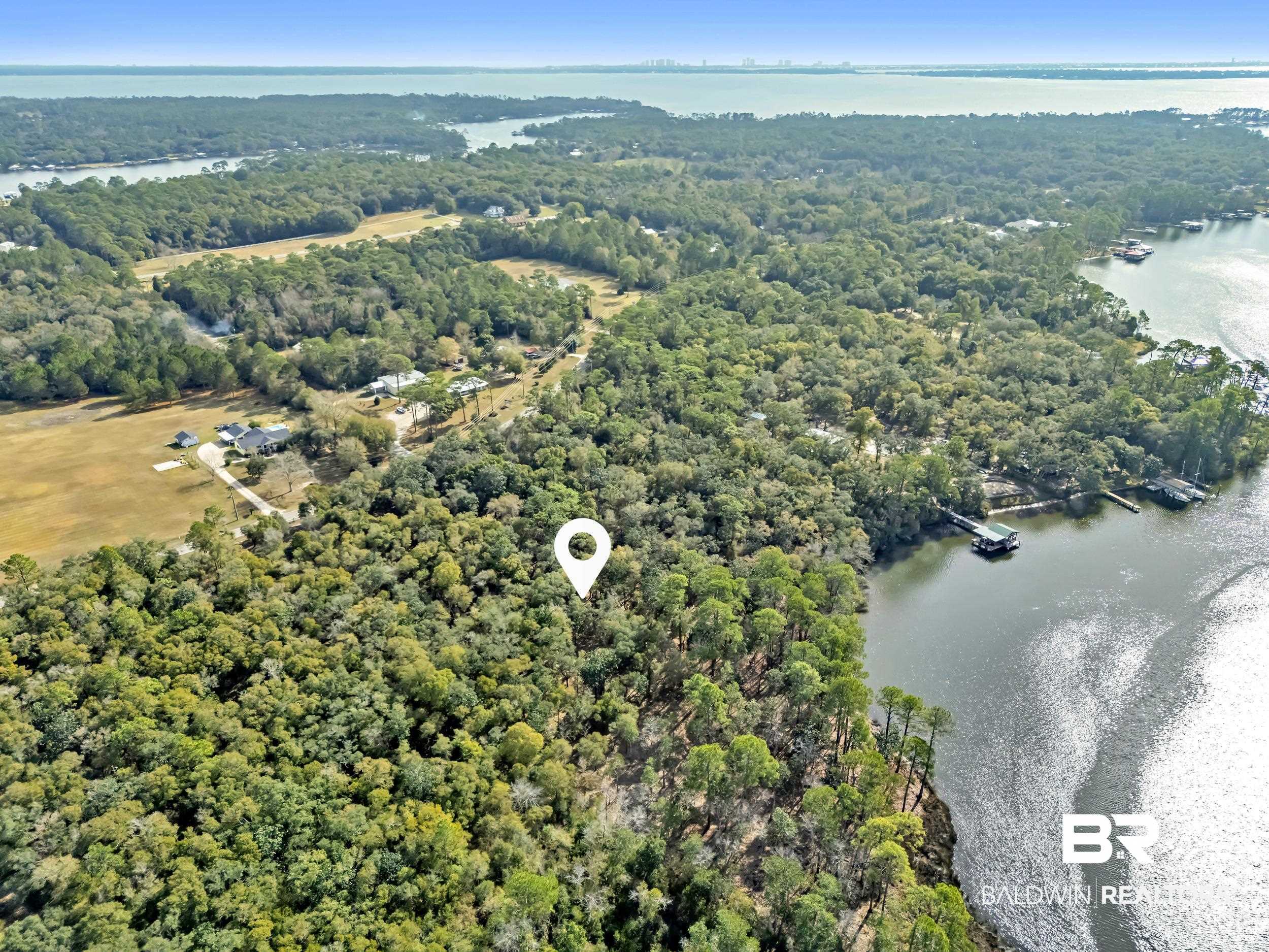 0 County Road 97 Elberta, AL 36530 - Photo 26 of 29 Aerial view of property's location featuring a forest and a nearby body of water