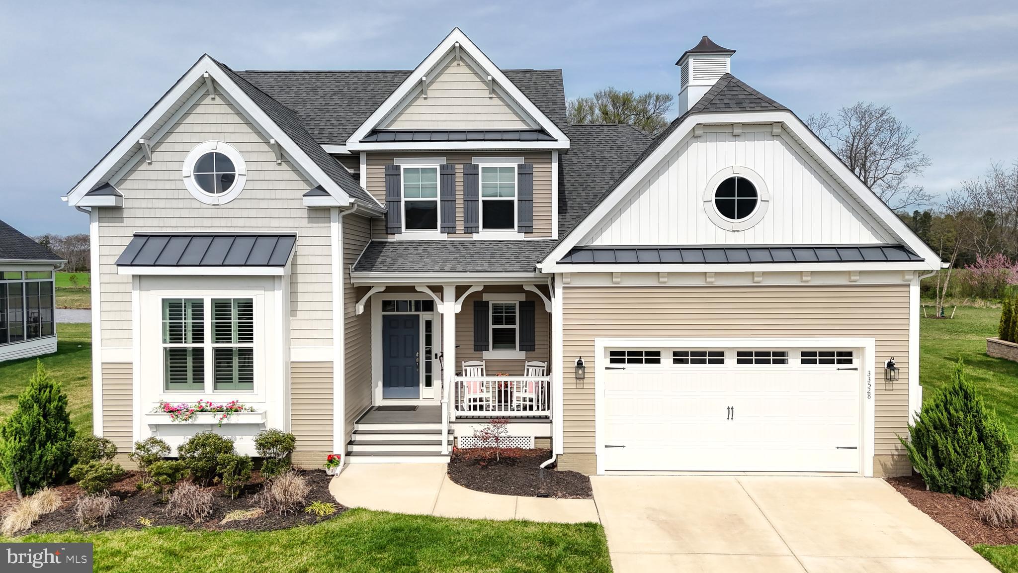 33528 Downing Circle Lewes, DE 19958 - Photo 1 of 72 front view of a house with a yard