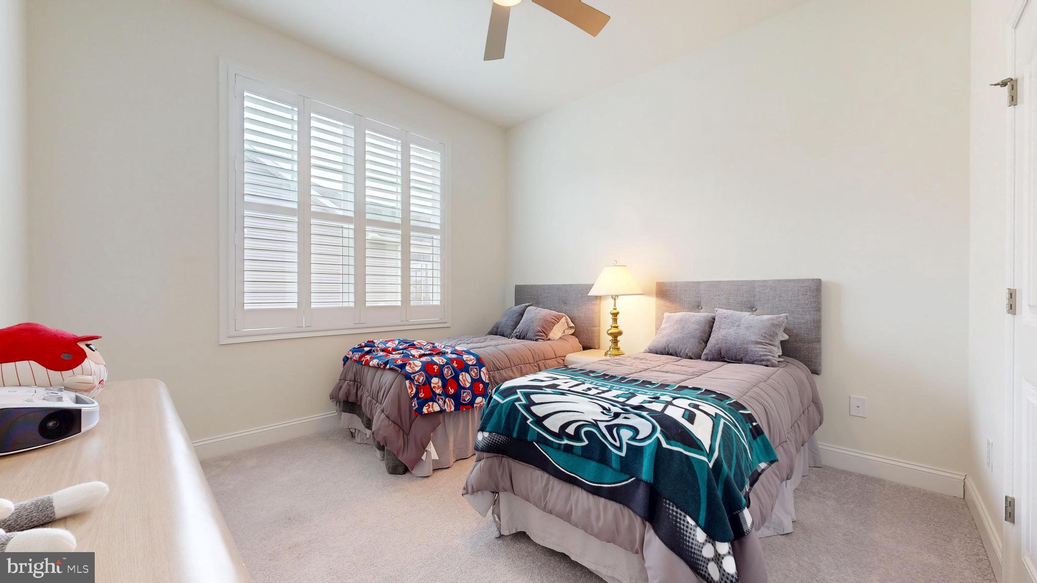 33528 Downing Circle Lewes, DE 19958 - Photo 40 of 72 a bedroom with a bed and a window