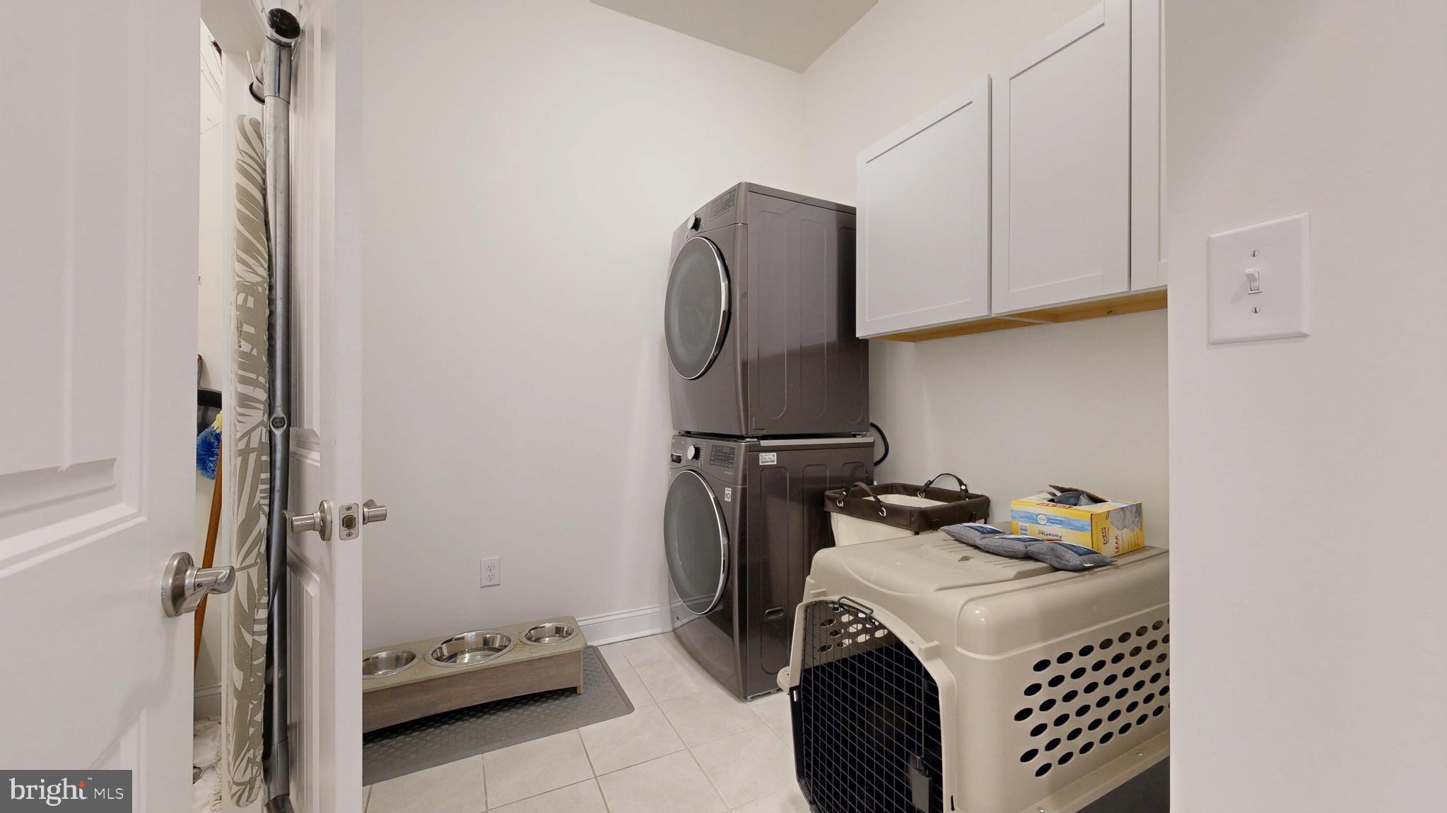 33528 Downing Circle Lewes, DE 19958 - Photo 48 of 72 a utility room with dryer and washer