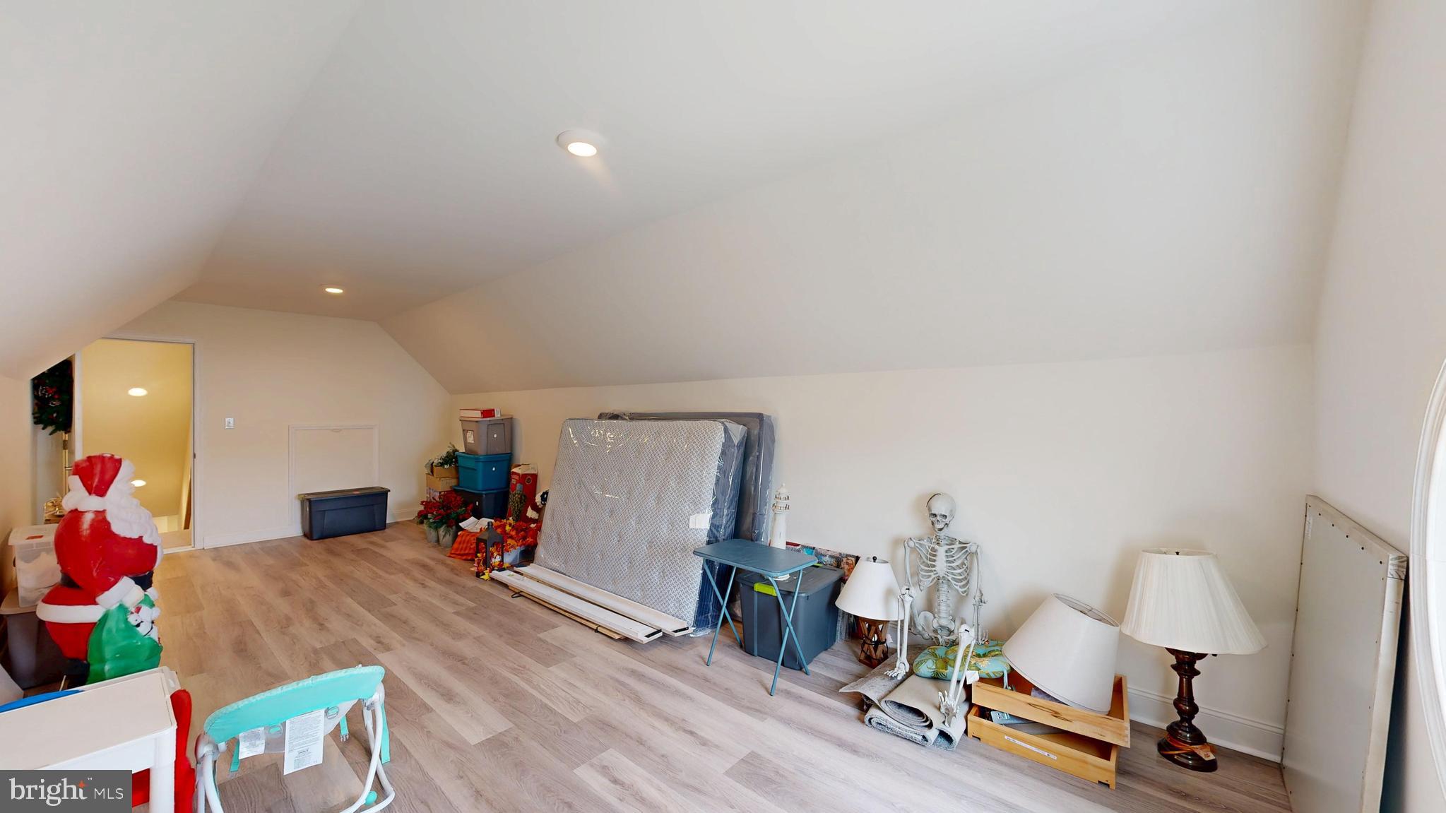 33528 Downing Circle Lewes, DE 19958 - Photo 50 of 72 a view of a workspace with furniture and a wooden floor