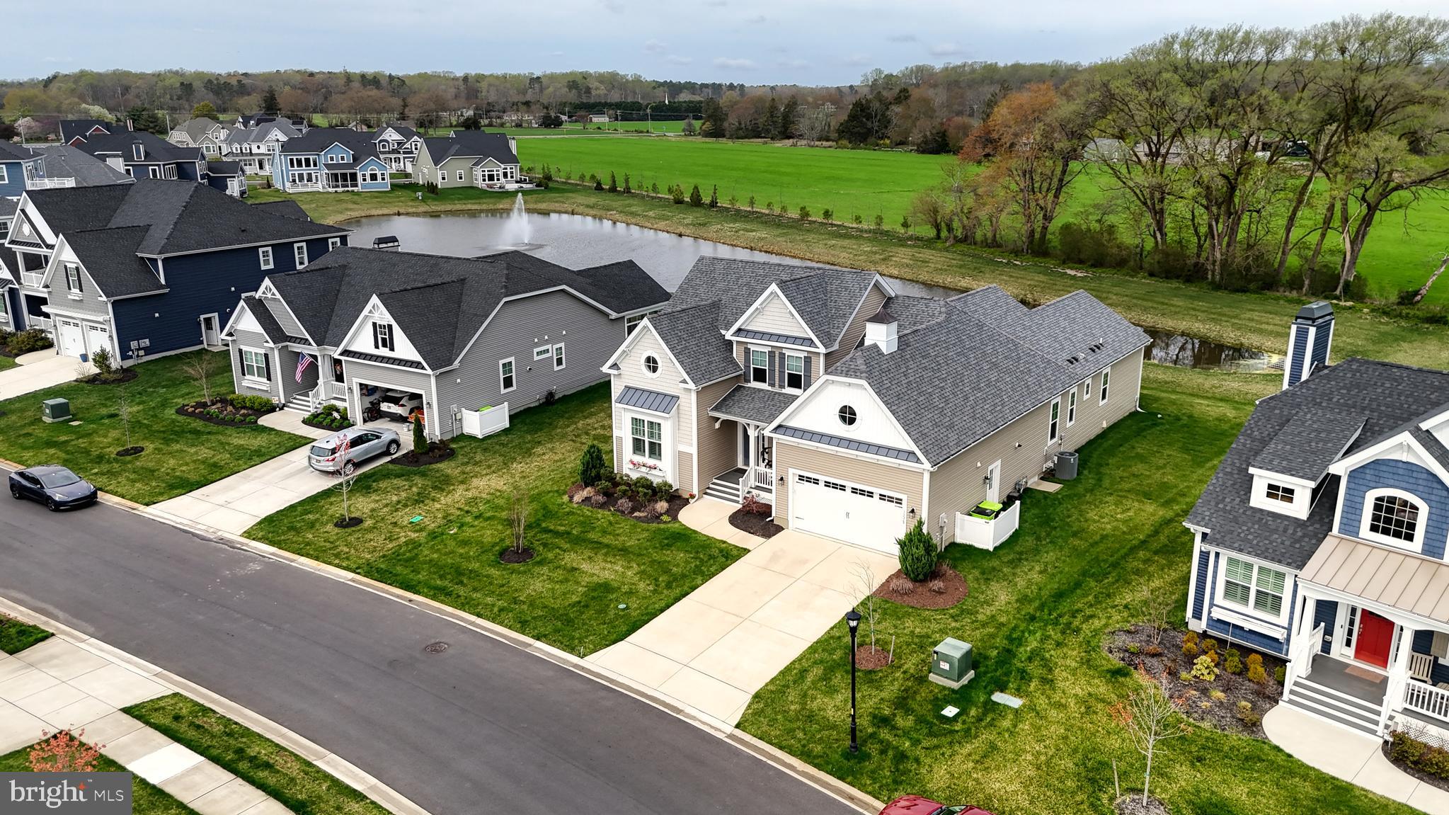 33528 Downing Circle Lewes, DE 19958 - Photo 5 of 72 an aerial view of a house with garden space and street view